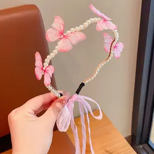 A Single Pearl Headband from The Princes