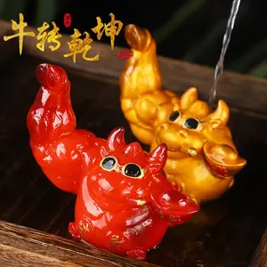 Color-changing tea pet ornament for the Year of the Ox, symbolizing prosperity and wealth, a golden ox that can be nurtured, tea set accessory, a color-changing tea pet that can be raised