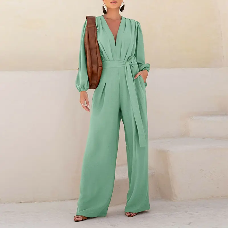 CHICME Puff Sleeve Plunge V Neck Waist Tied Detail Jumpsuit Casual Wedding Guest Ruched Textured Loose Wedding Romper with Pockets