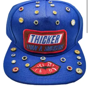 Thicker Than A Snickers Blue Snapback Hat with Rhinestone Accents and Red Lip Patch bundle