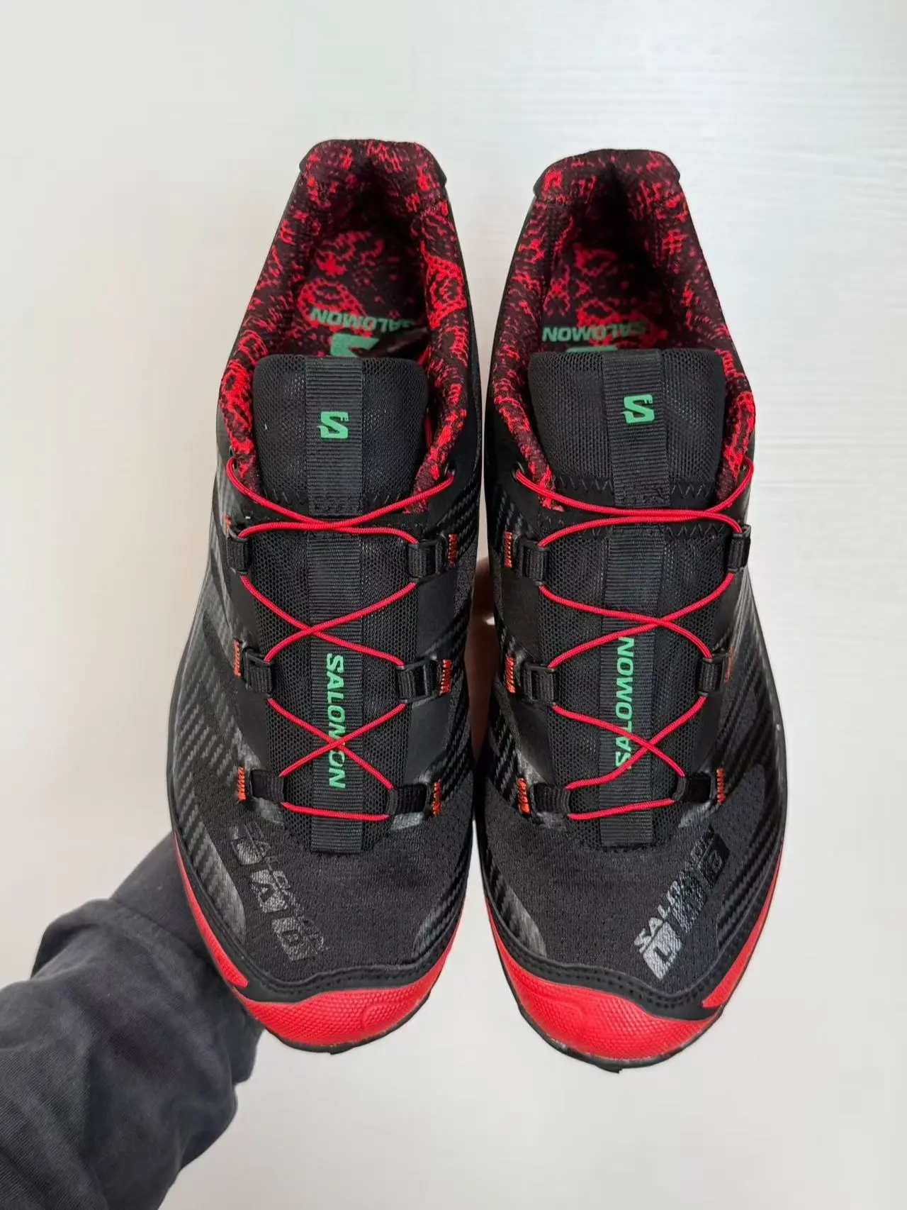 The Salomon XT-6 is a unisex, stylish outdoor sneaker featuring a lightweight construction and a deep-lugged rubber outsole—perfect for hiking on rocky terrain, elevating your street-style look, or wearing while on vacation.