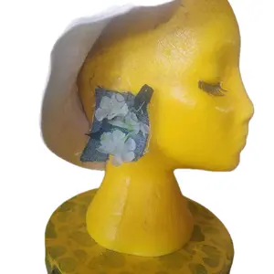 Denim and Flower Ragged Edge Stud Earrings - Unique Design with Floral Accent on Yellow Mannequin Display, 3x2.8x5 Inches