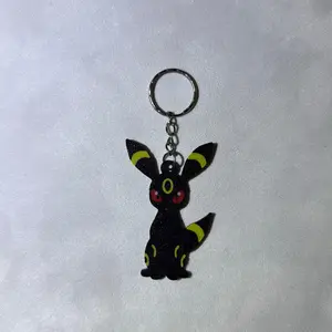 3D Printed  Keychain - Black and Yellow Design Featuring a Popular Character