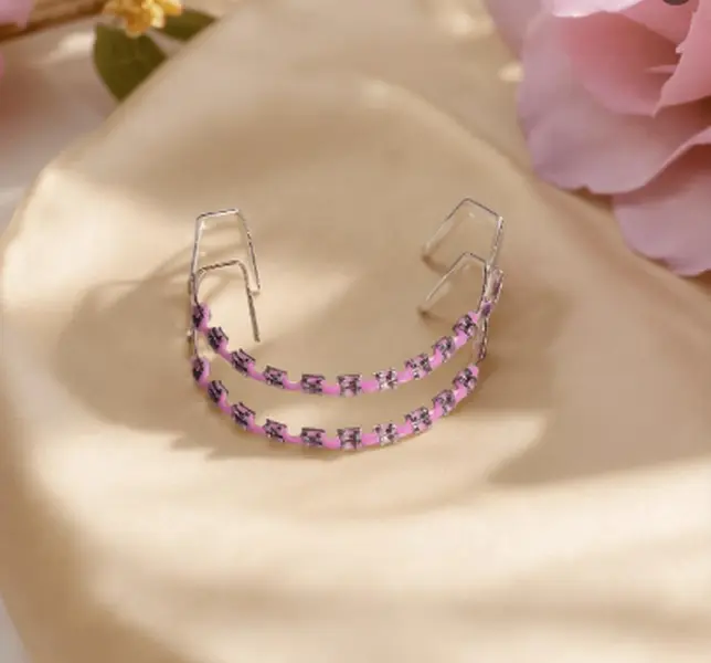 Pink Orthodontic Retainer with Metal Hooks for Teeth Alignment and Comfortable Fit Colorful Dental Braces Set