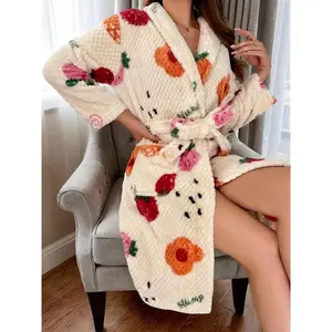 Women’s textured flannel robe with floral and fruit print, pockets, a casual aesthetic, long sleeves, and a shawl collar; pink dressing gown for autumn and winter; women’s sleepwear; women’s clothing; home wear; apricot casual soft robe GARMENTARY