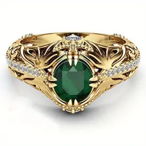 Emerald-plated 14K gold ring, a luxurious fashion statement with a simulated diamond engagement ring design