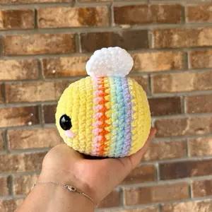 Handmade crochet rainbow bee plushie