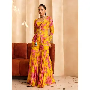 Yellow printed short jacket, blouse and sharara