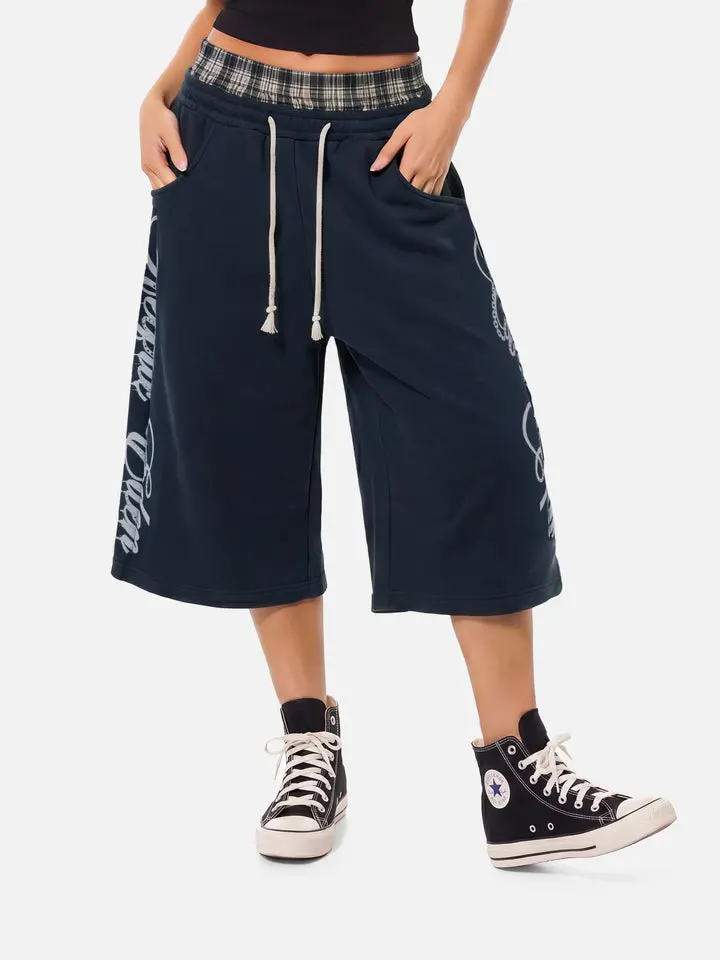 Aelfric Eden Double Waist Script Longline Shorts Double Waistband Layered Design Gothic Script Print Wide Leg Five Point Silhouette Soft Knit Sweatshirt Fabric Retro Streetwear Unisex Shorts
