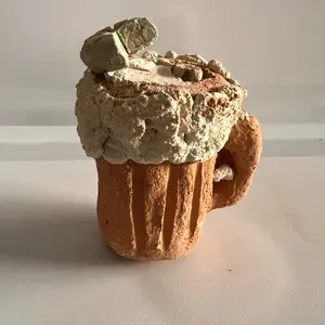 D-Crujidos. Miche-lada. Clay tarron 3 inches. Filled with caolin koko, jaspe, and trocitos terrenales. Made in mexico