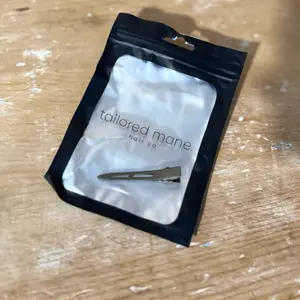 Oversized single prong hair clips for holding weft extensions