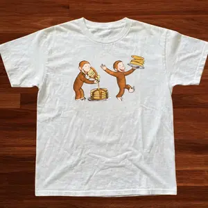 Funny Monkey Pancake Graphic Tee, Curious georgee tee – Cute Breakfast Lover Shirt, Playful Cartoon Design T-Shirt,  crewneck, unisex shirt, gift for him for her, cartoon shirt