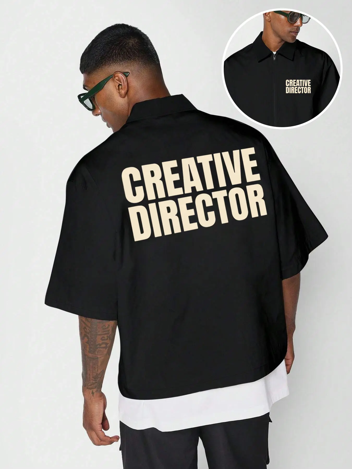 Creative Director Overshirt Bold 'CREATIVE DIRECTOR' Graphic print (front + back) — oversized, Casual, sleek black + neutral lettering. Perfect for streetwear, OOTD fits, or creative energy, Aesthetics. Zippered, short-sleeve, comfort, Menswear Fashion