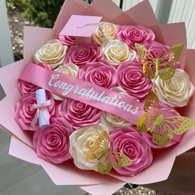 Congratulations Bouquet with Pink and Cream Roses Gold Butterflies and Graduation Cap for Special Occasions Elegant Design Perfect for Graduations