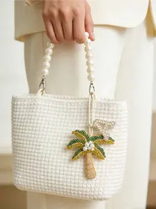 Palm tree pendant with pearl beaded design, can be used as bag charm, luggage tag and car rearview mirror ornament. Stylish accessory for handbags, backpacks and keys. Perfect summer essential and ideal gift for Valentine’s Day, Easter and Mother’s Day.