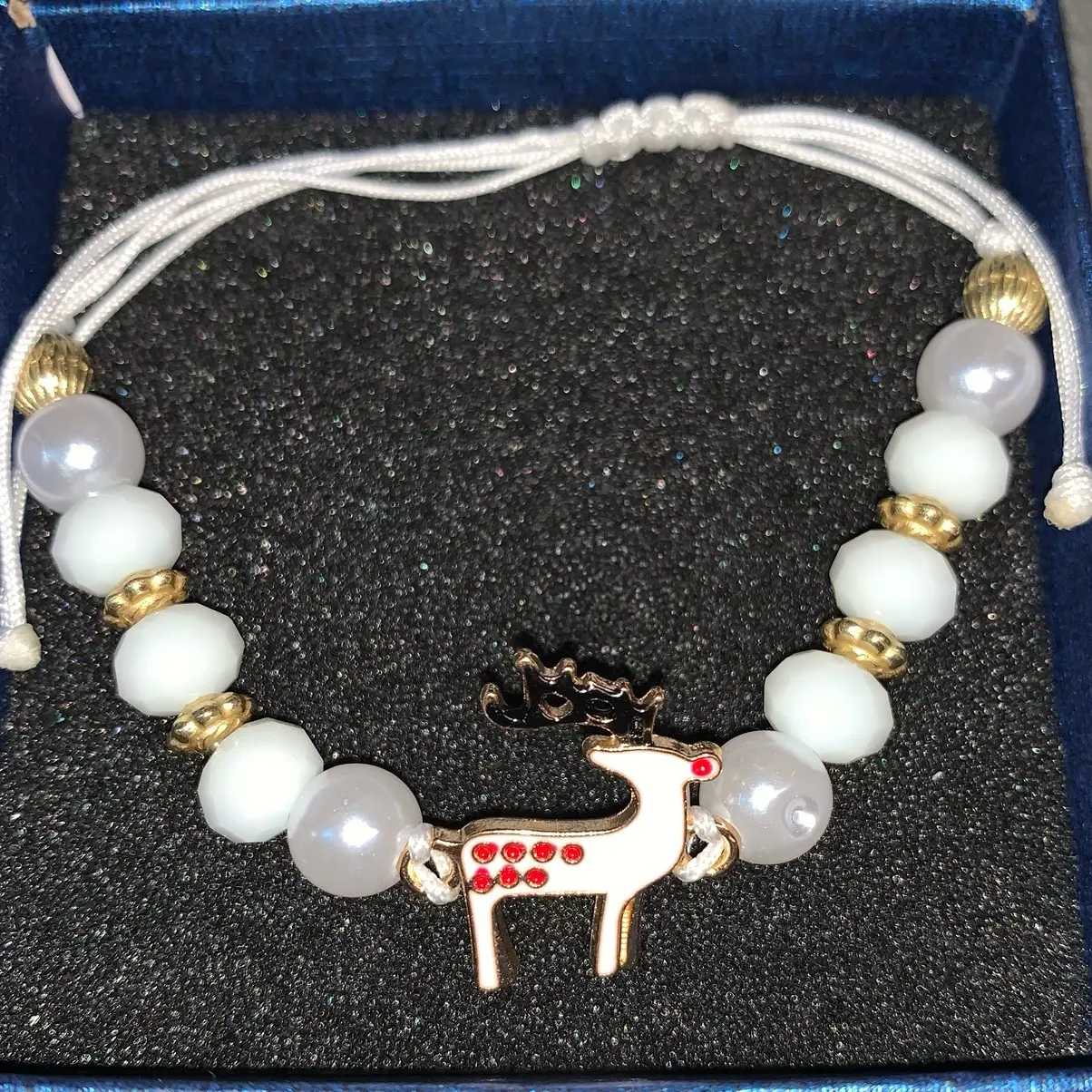 Adjustable corded bracelet with deer and beads