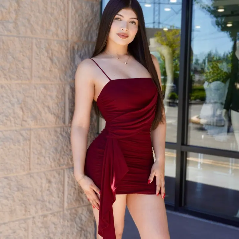 Elegant dress with side draping