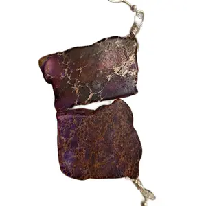 Beautiful stone wrapped around bracelet with shells and different beads in the colors are sliver and gold bronze.. necklaces and bracelets and earrings….