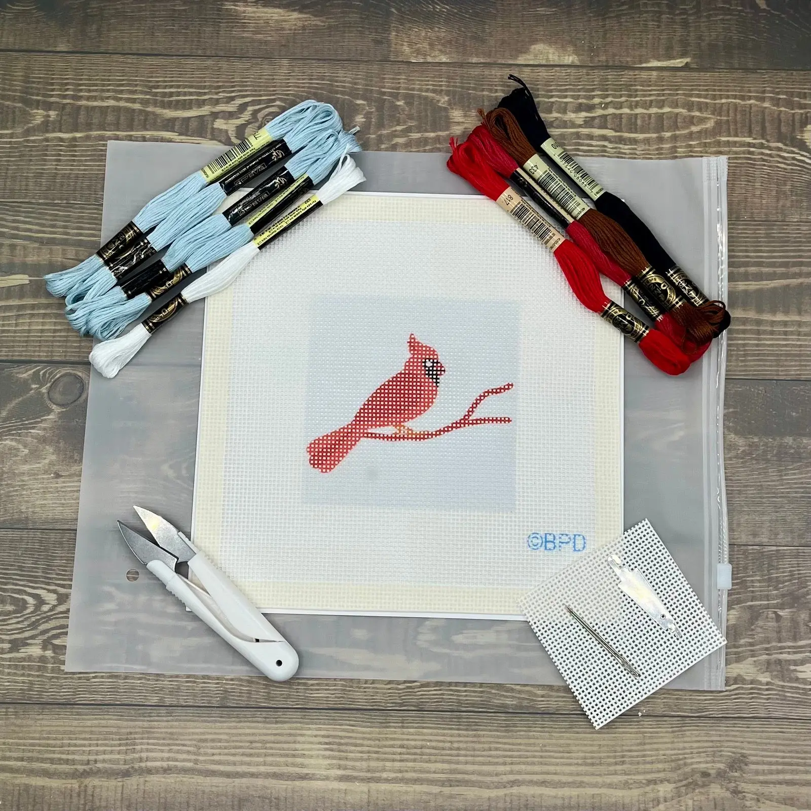 Cardinal Needlepoint Design (red beak on light blue) Cardinal Needlepoint Design (red beak on light blue)