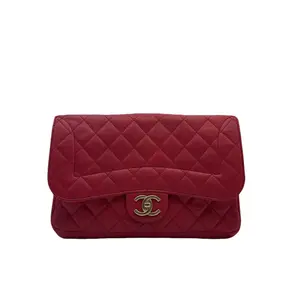 Pre-owned CHANEL limited edition medium sized CF chain bag in red and gold calfskin. 19984522