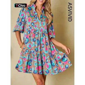 Women’s smock dress with all-over print, frill trim, ruffle hem, lantern sleeves, and a notched neckline—casual boho elegant style for spring and fall; women’s clothing for everyday wear