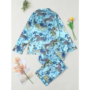 Blues animal print silk-like pajamas: long sleeves,pants, lapel,button design, all-over prints of zebras,tigers and leaves.Cool to the touch, a great choice for home.Cool,soft loungewear-comfortable and stylish.Menswear Nightwear Bestie Polyester Set Tops