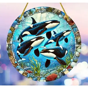 Ocean blue acrylic suncatcher, whales swimming gracefully, vibrant décor.