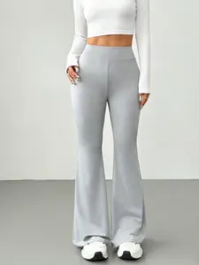 A fashionable gray high waisted slightly flared casual pants for women, with a slightly flared design that accentuates curves and leg length. Suitable for commuting to work, shopping and outdoor activities, indoor and outdoor dressing