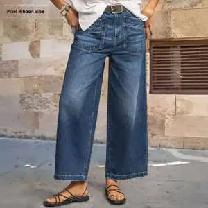 Stretchy mid-waist wide-leg plus-size jeans with vintage wash, frayed hem, and slanted pockets, cropped length