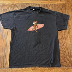 Curious Georgee Surfing Graphic T-Shirt – Black Cotton Tee, Cute Cartoon Monkey Shirt, Unisex Casual Streetwear Top, unisex shirt, gift for her for him