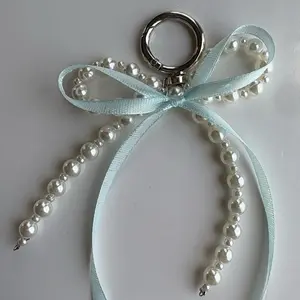 Bow Keychain with Light Blue Ribbon and Pearl Beads Decorative Accessory