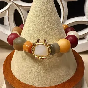 Santa's Sleigh Beaded Bracelet with Gold Plated Charm and Multicolor Beads for Festive Wear