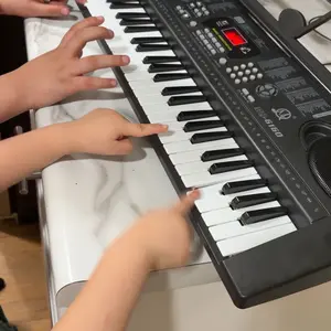 Piano Keyboard, 61 Keys Gift Teaching for Beginner, Electronic Keyboard Portable Digital Music Keyboard,60 Demo Songs,200 Tones,200 Rhythms, Early Education Music Instrument with Microphone & Music Sheet Stand