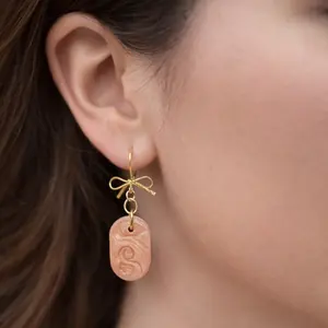 Hypoallergenic Peach Bow Earrings