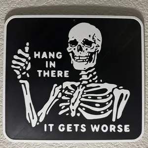 Hang in there, it gets worse skeleton wall plaque