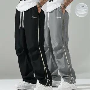 Men's Summer Loose Fit Sports Pants 2 Pack Long Length Lightweight Soft Fabric Large Cut Gray Side Strips with Gold Accents Comfortable Design Casual Sporty Bottoms Workout Wear 100% Polyester