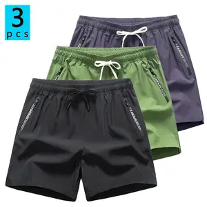 Men’s summer athletic shorts available in packs of 1/2/3; solid-color fitness running shorts with multiple color options and zippered pockets; suitable for everyday outdoor sports, basketball, and jogging. Menswear