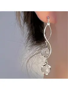 A pair of unique and elegant French-style long tassel earrings with glass inlay, offering a cool and sophisticated look for women at prom and parties