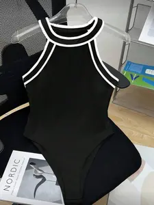 Pure lust-style color-blocked halter one-piece, European and American style slim-fit and figure-flattering halter top, nightclub-style black and white color-blocked halter one-piece