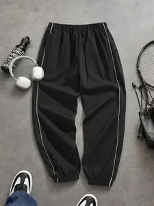 Men’s long pants for spring and autumn — side contrast stripe design, urban outdoor street-style athletic pants, casual pants, jogging pants, drawstring waist, loose straight-leg fit