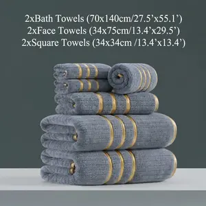 6-Piece Coral Fleece Towel Set featuring gold-trimmed embroidery and striped texture. Includes a hand towel (34 x 34 cm), a face towel (34 x 75 cm), and a bath towel (70 x 140 cm). Soft, quick-drying, and highly absorbent, this set is ideal for home, hote