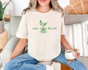A Tini Bit Irish T-Shirt, St Patrick’s Day Martini Graphic Tee, Minimal Shamrock Line Art, Chic Green Holiday Top, Cute Martini Shirt, Funny St Paddy’s Day Shirt, Irish Shirt