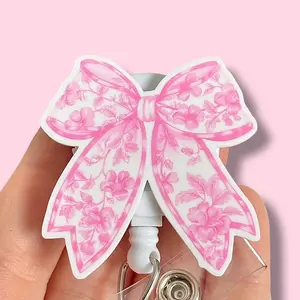 Glitter My Badge Pink paisley bow badge reel for nurse and hospital workers. Badge clip Badge pull - Retractable swivel clip with a 360 rotation. Great gift for coworker.