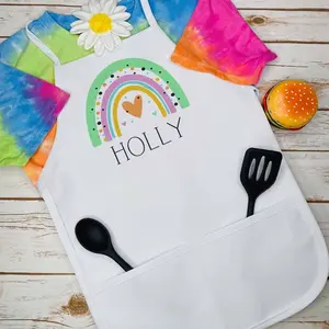 Custom Rainbow Kids Apron with Rainbow Design, "HOLLY" Text, Pockets, and Fun Accents