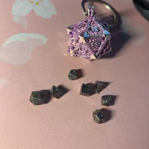 Mini Metal D&D Dice Set, 7 Counts Hollow D20 Dice with Keychain, Twenty-Sided Shape DND Metal Dice, Perfect for Party Games