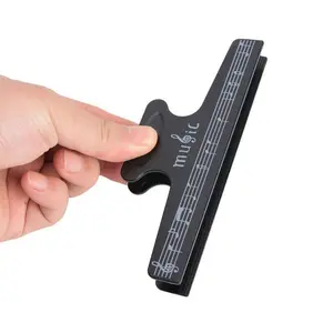 Piano sheet music clip, music score clip, book clip, note and staff fixation