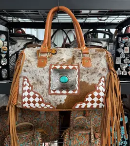 Genuine hand painted leather & cowhide medium sized duffle with fringe