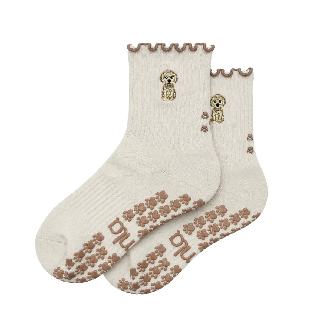 The Golden Retriever Embroidery Grip Sock with light-brown heart-shaped paw print grips for Pilates, Barre, Lagree, and Yoga