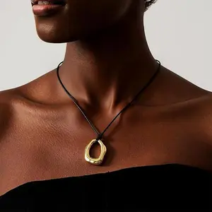 LuckyJewelry B Statement Necklace for Women Chunky Gold Pendant Necklace Long Pebble Charm Leather Adjustable Black Cord Vintage Boho Western Bean Birthday Christmas Jewelry Gifts