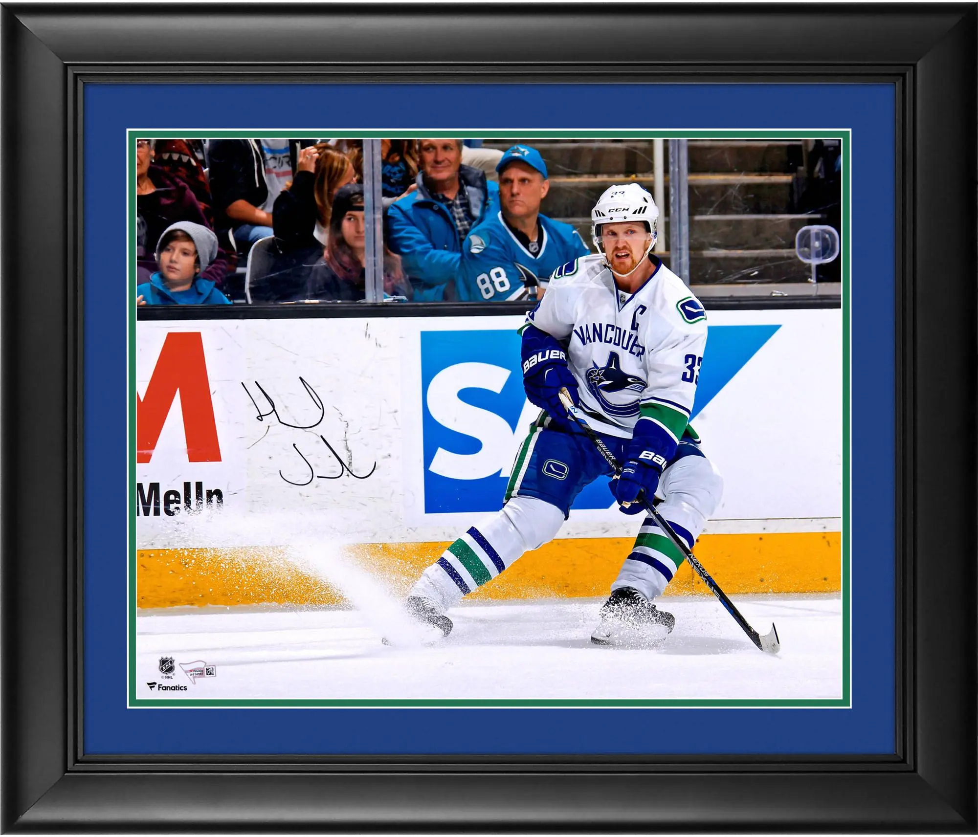 Henrik Sedin Vancouver Canucks Framed Autographed 16" x 20" White Jersey Stopping Photograph - Fanatics Authentic Certified